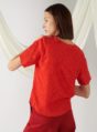 textured top with curved hem in red